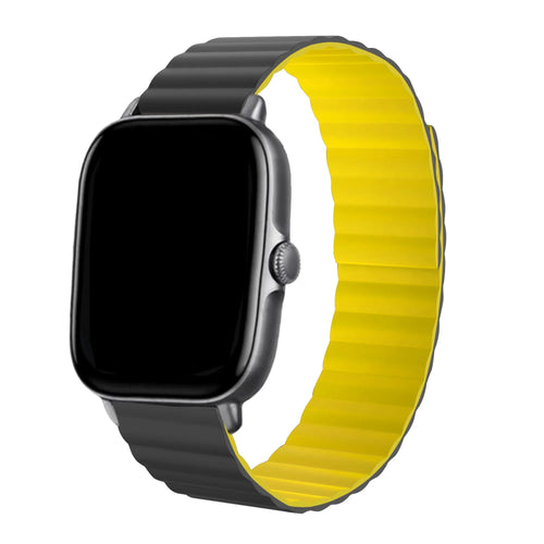 Magnetic Silicone Strap, black/yellow, on a watch, 3/4 front view