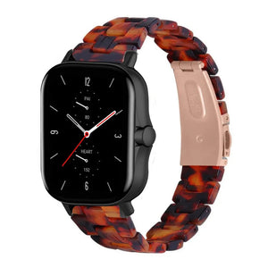 Metal Resin Strap, lava, on a watch, 3/4 front view