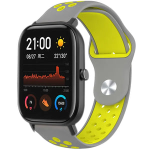 Silicone Sport Strap, grey/yellow, on a watch, 3/4 front view
