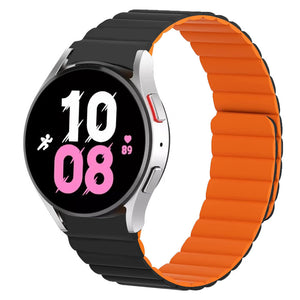 Magnetic Silicone Strap, black/orange, on a watch, 3/4 front view
