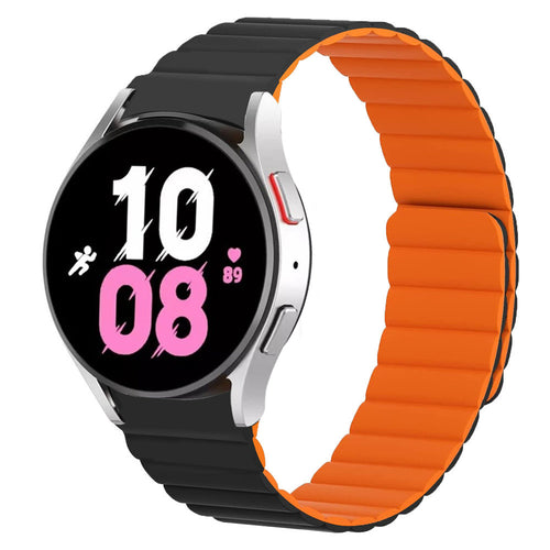 Magnetic Silicone Strap, black/orange, on a watch, 3/4 front view