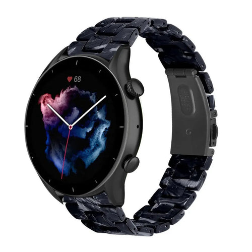 Metal Resin Strap, black/white, on a watch, 3/4 front view