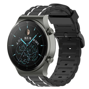 Silicone Sport Strap with Buckle, black/white, on a watch, 3/4 front view