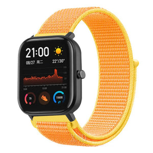 Nylon Strap, light yellow, on a watch, 3/4 front view