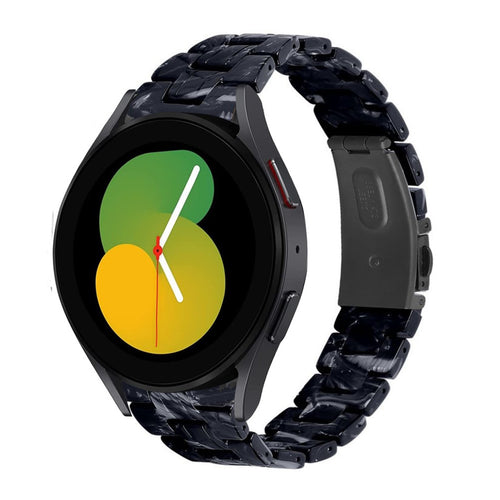 Metal Resin Strap, black/white, on a watch, 3/4 front view