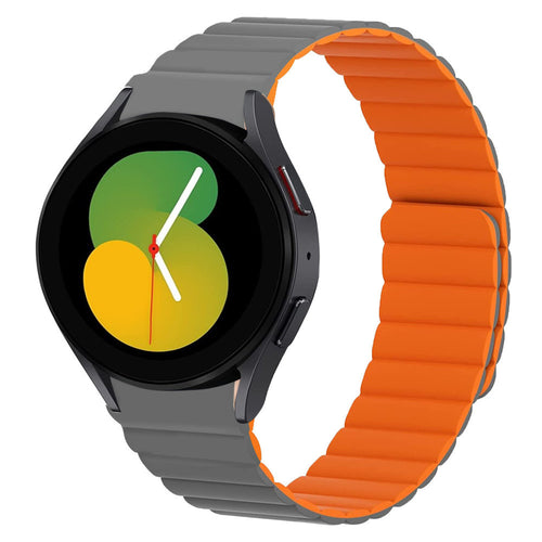 Magnetic Silicone Strap, grey/orange, on a watch, 3/4 front view
