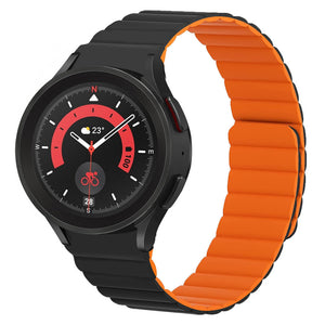 Magnetic Silicone Strap, black/orange, on a watch, 3/4 front view