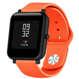 Silicone Sport Strap, orange, on a watch, 3/4 front view