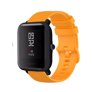 Premium Silicone Strap, orange, on a watch, 3/4 front view