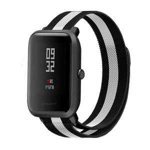 Milanese Strap, black/white, on a watch, 3/4 front view