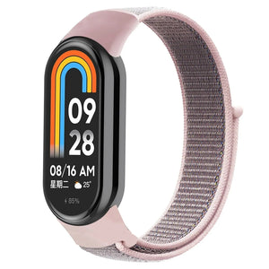 Nylon Strap, pink sand, on a watch, 3/4 front view