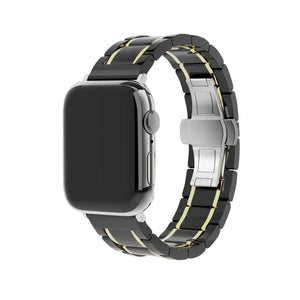 Metal Ceramic Link Strap, black/gold, on a watch, 3/4 rear view