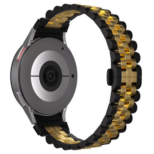 Jubilee Steel Strap, black/gold, on a watch, 3/4 rear view