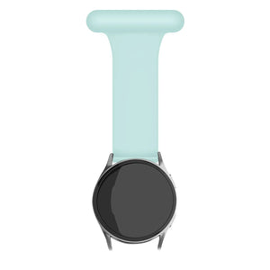 Silicone Nurse Fob, light green, on a watch, direct front view