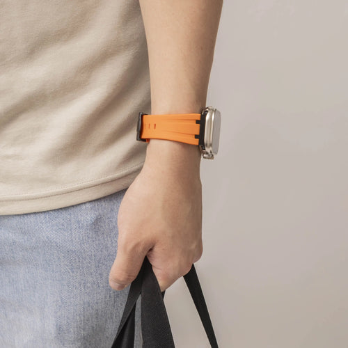Luxury Liquid Silicone Strap, orange/black, lifestyle photo