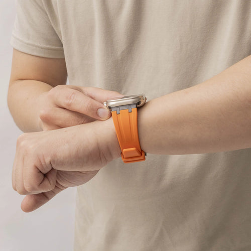 Luxury Liquid Silicone Strap, orange/black, lifestyle photo